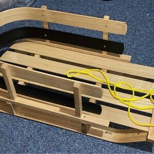 Wooden Sled with Yellow Rope